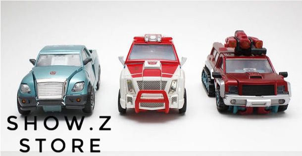 Three Autobot warrior robots in cyan red and burgundy colors Three Autobot warrior robots in cyan red and burgundy colors