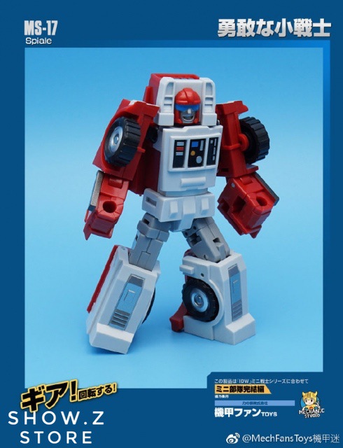 Red warrior robot in action pose with weapons extended Red warrior robot in action pose with weapons extended