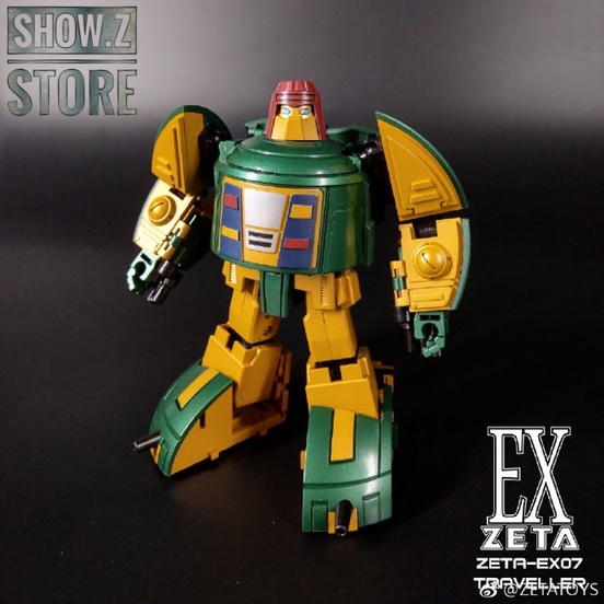 Green transformer with yellow detailing on neutral background Green transformer with yellow detailing on neutral background