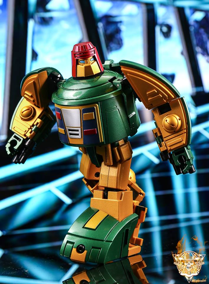 Green and orange robot in dynamic standing pose with extended weapons Green and orange robot in dynamic standing pose with extended weapons