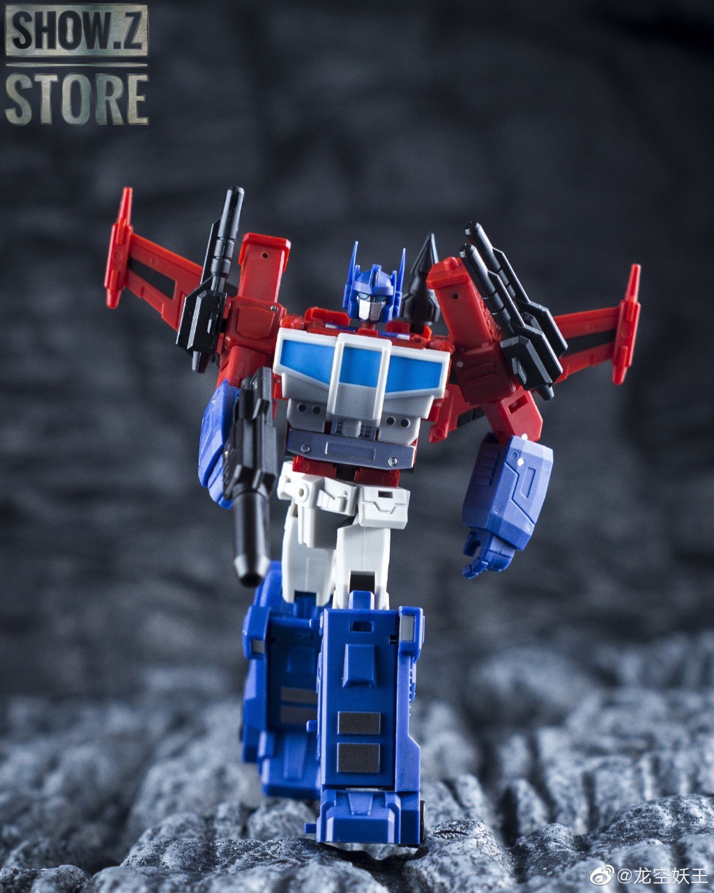 Red and white robot figure with extended armor configuration Red and white robot figure with extended armor configuration