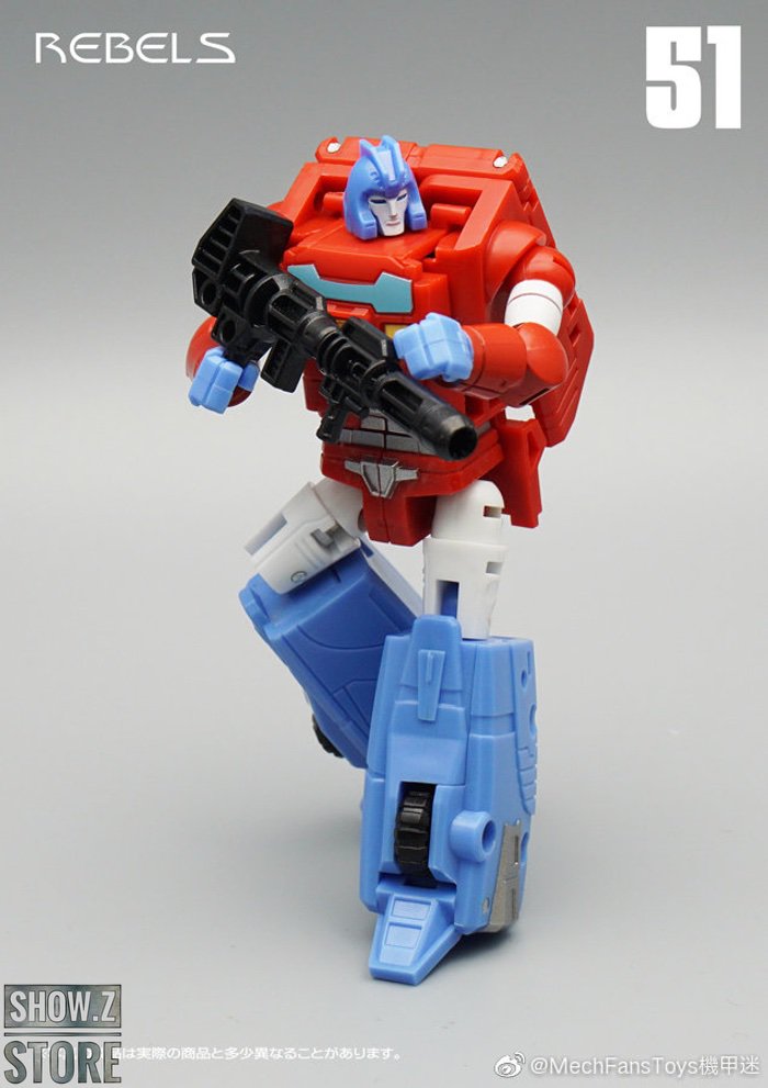 Red blue and gold combiner robot in humanoid battle stance articulated Red blue and gold combiner robot in humanoid battle stance articulated