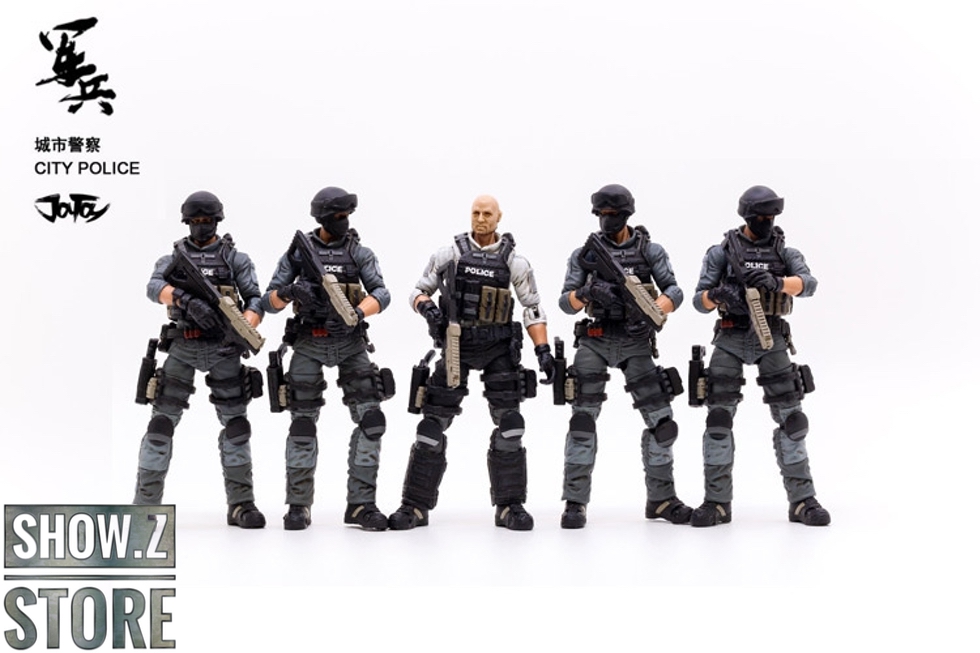 Five tactical police officers with rifles helmets tactical gear Five tactical police officers with rifles helmets tactical gear