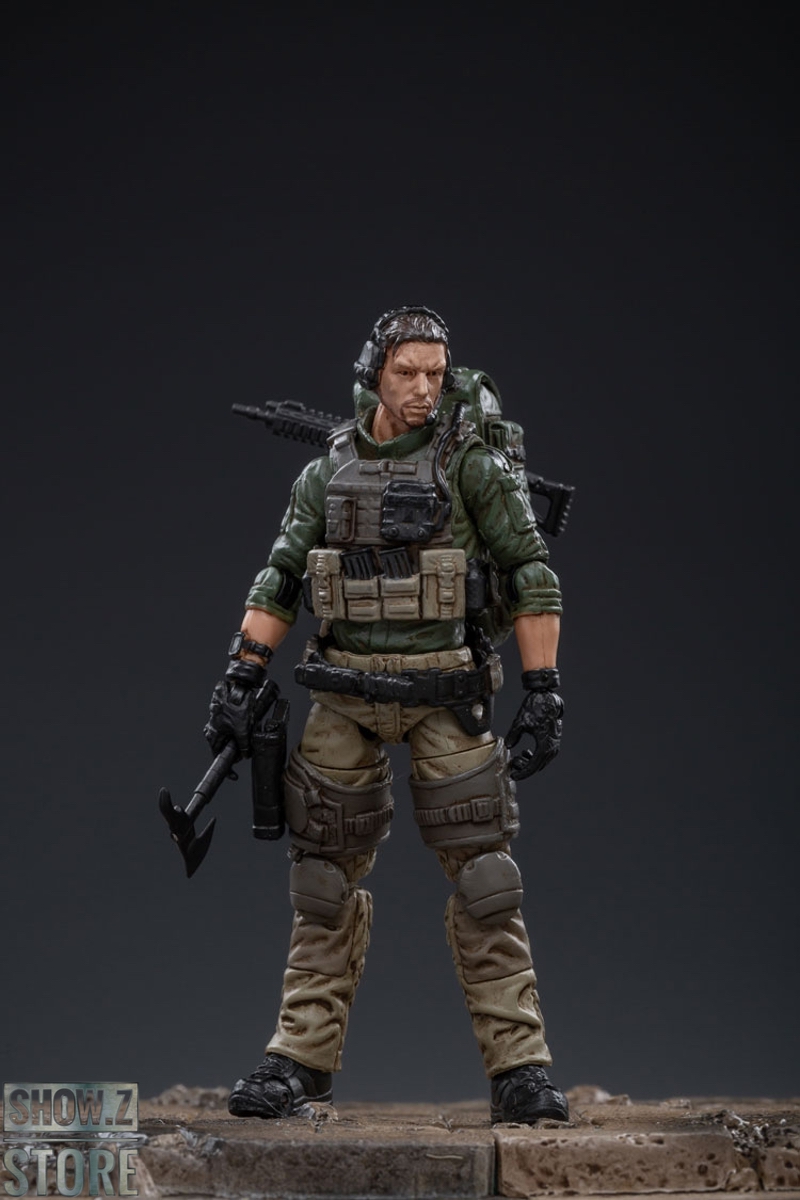 Individual USMC reconnaissance soldier with rifle profile view Individual USMC reconnaissance soldier with rifle profile view
