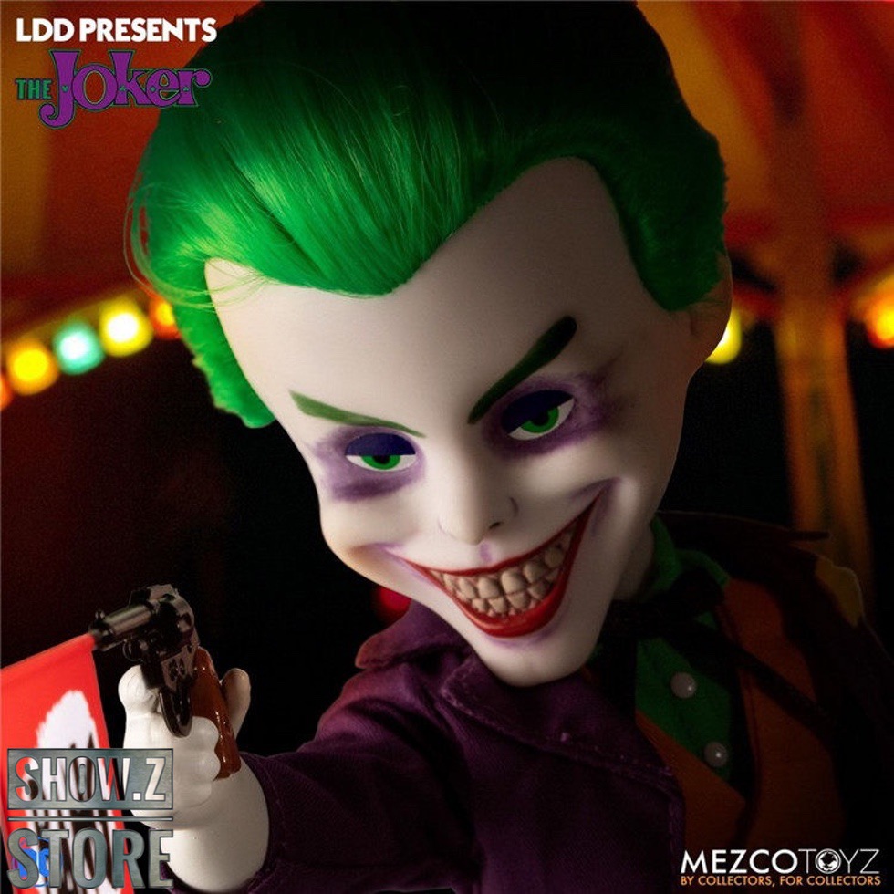Joker LDD figure in purple outfit against brick wall background Joker LDD figure in purple outfit against brick wall background