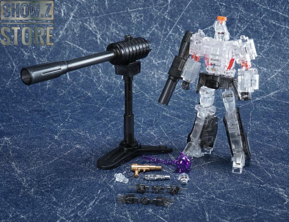 Megatron clear and gold version two-pack comparison with accessories display Megatron clear and gold version two-pack comparison with accessories display