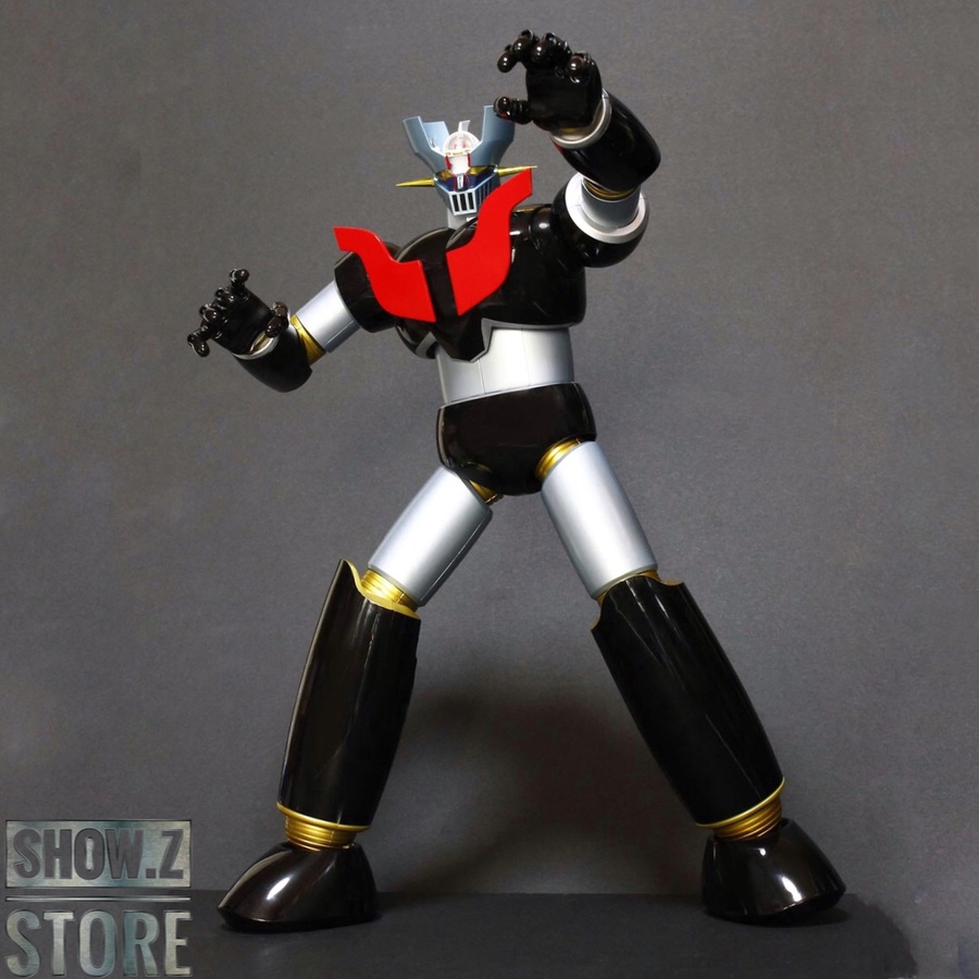 Mazinger Z giant robot with red chest emblem and black limbs standing Mazinger Z giant robot with red chest emblem and black limbs standing
