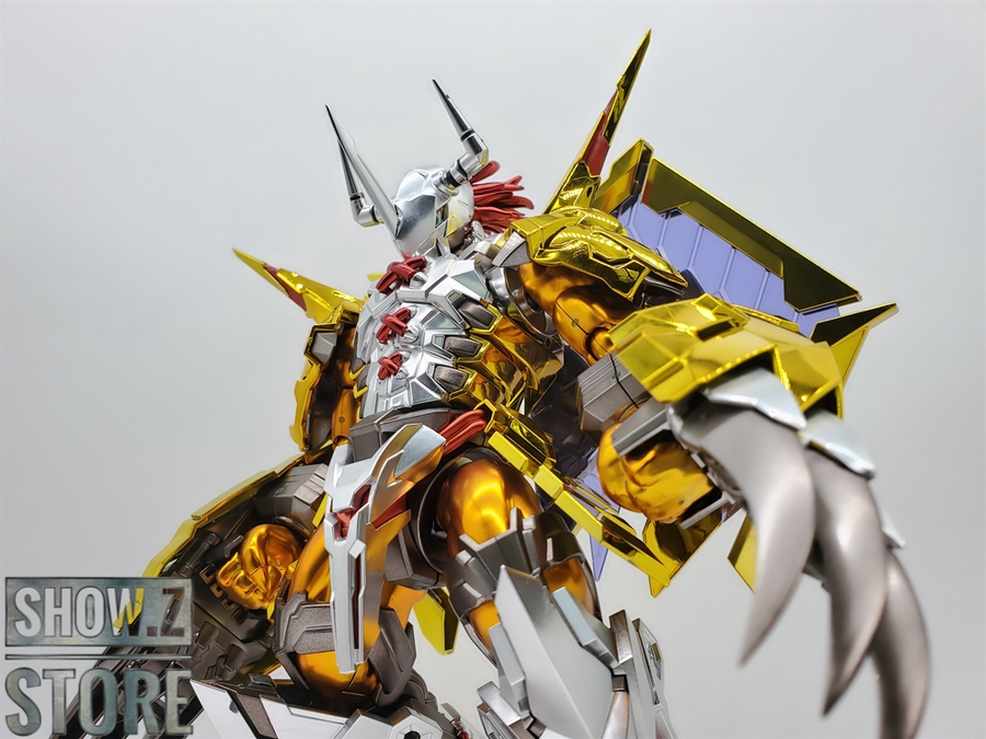 Wargreymon yellow orange black Digimon poseable figure with claws and wings Wargreymon yellow orange black Digimon poseable figure with claws and wings