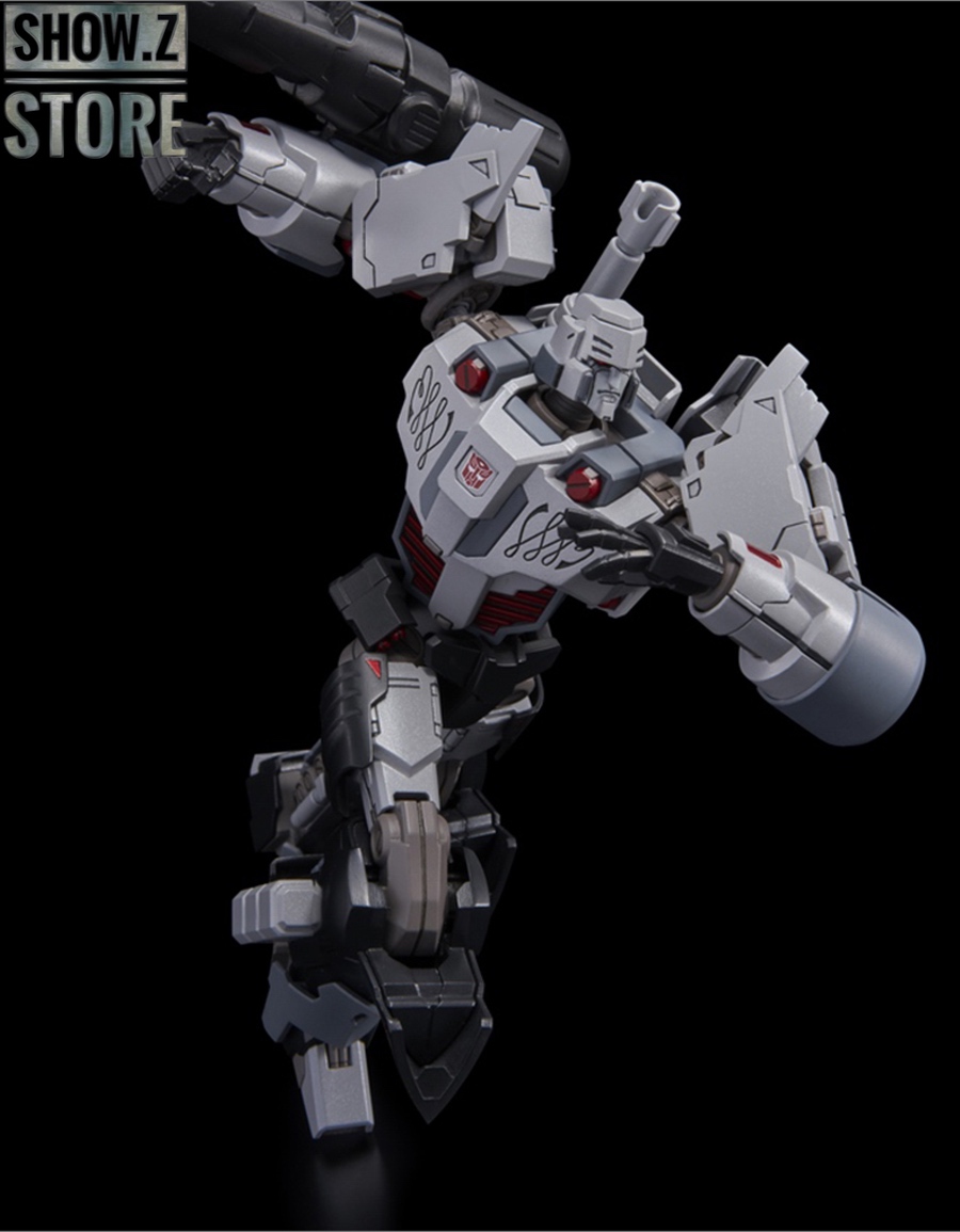 Gray and orange robot figure photographed in full body pose Gray and orange robot figure photographed in full body pose