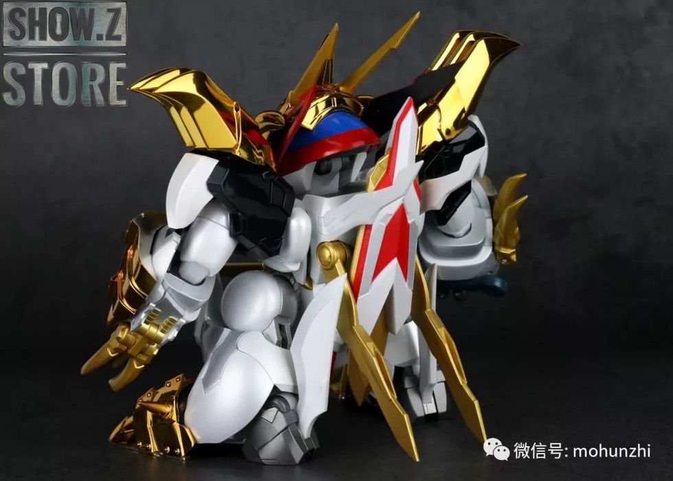 Front facing white and gold robot with articulated armor joints Front facing white and gold robot with articulated armor joints