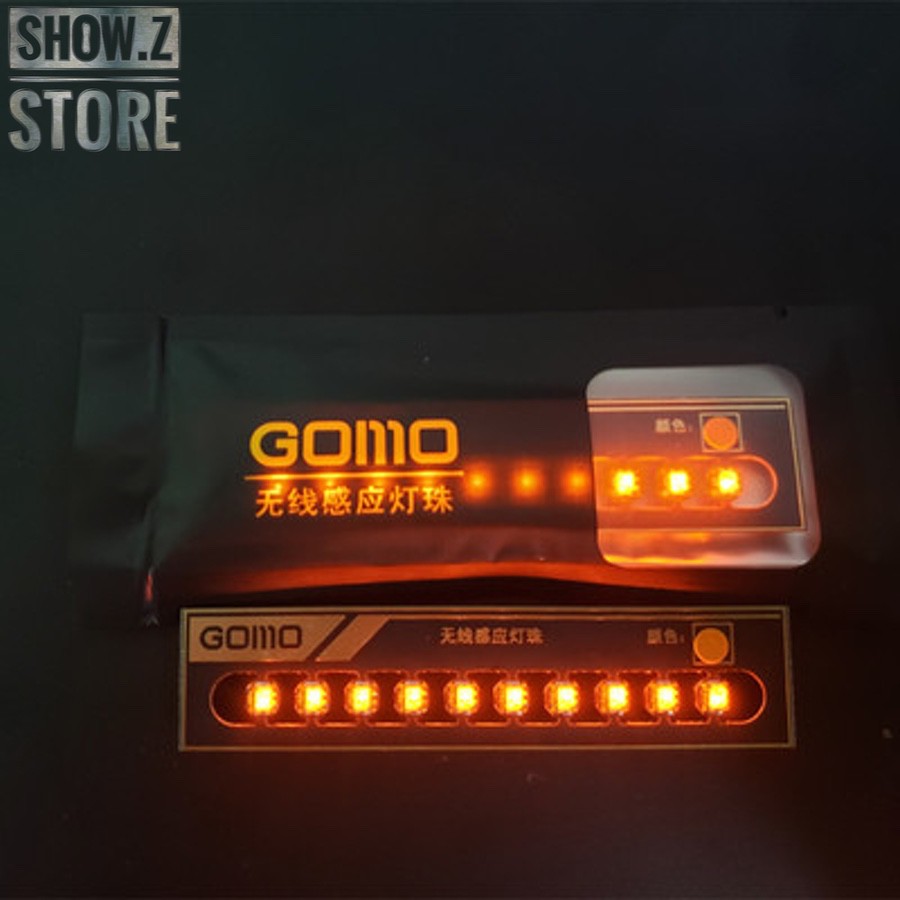 GOMO wireless orange LED light strip illuminated in dark setting GOMO wireless orange LED light strip illuminated in dark setting