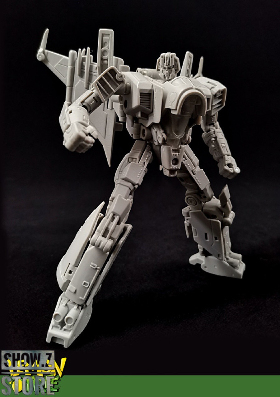 Starscream clear figure showing transformation capability Starscream clear figure showing transformation capability