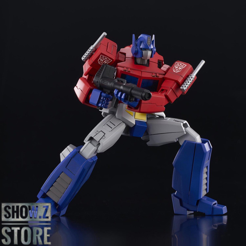Articulated Optimus Prime model with yellow accents on chest Articulated Optimus Prime model with yellow accents on chest