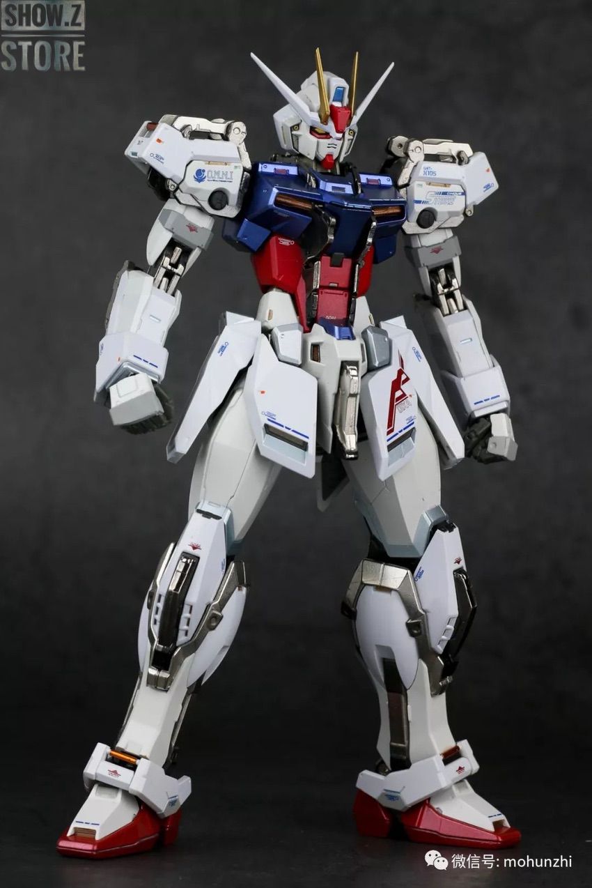 White blue red strike gundam mobile suit standing pose White blue red strike gundam mobile suit standing pose