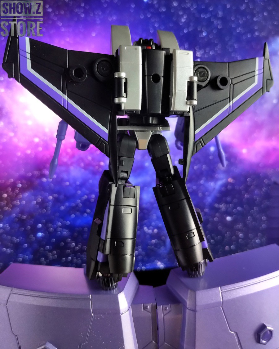 Robot in dynamic airborne pose showing full weaponry and transformation features Robot in dynamic airborne pose showing full weaponry and transformation features