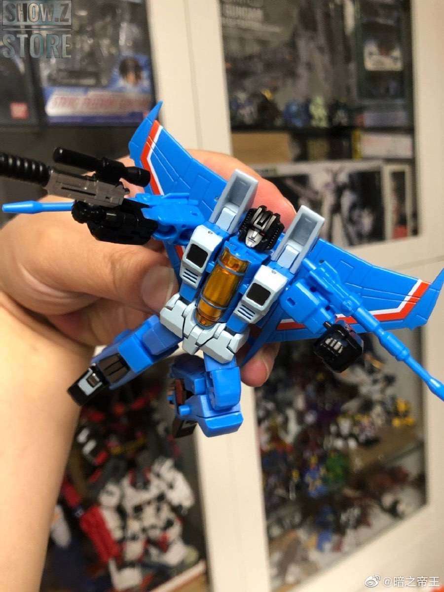 Blue transformer robot with extended wings aircraft configuration Blue transformer robot with extended wings aircraft configuration