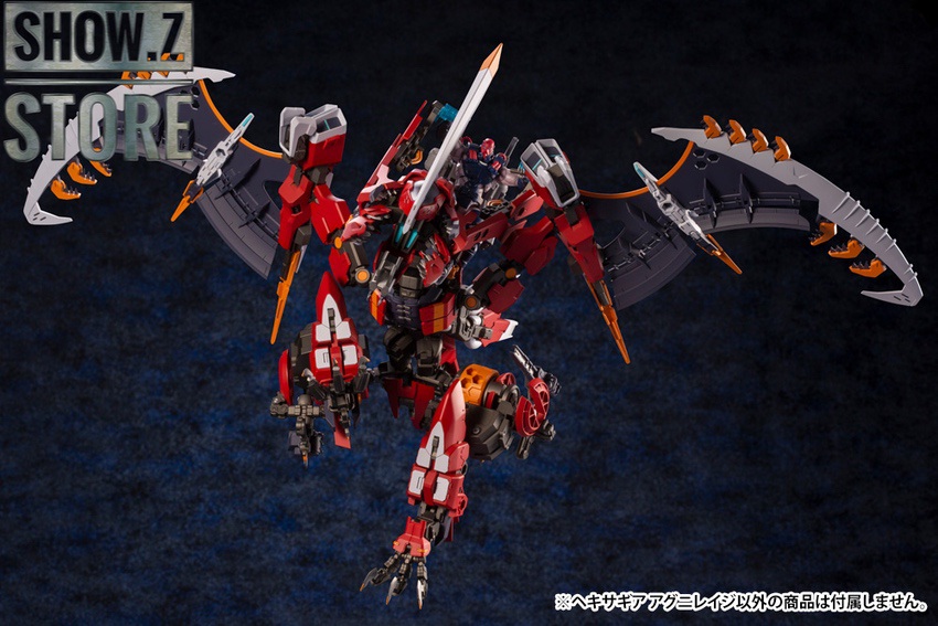 Robot in combat stance with interchangeable parts displayed Robot in combat stance with interchangeable parts displayed
