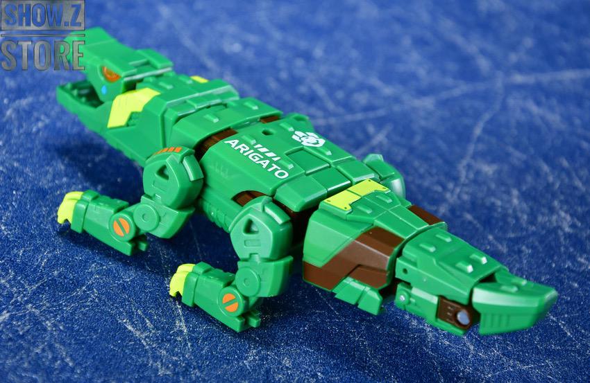Green and yellow crocodile transformer toy with yellow wheels Green and yellow crocodile transformer toy with yellow wheels