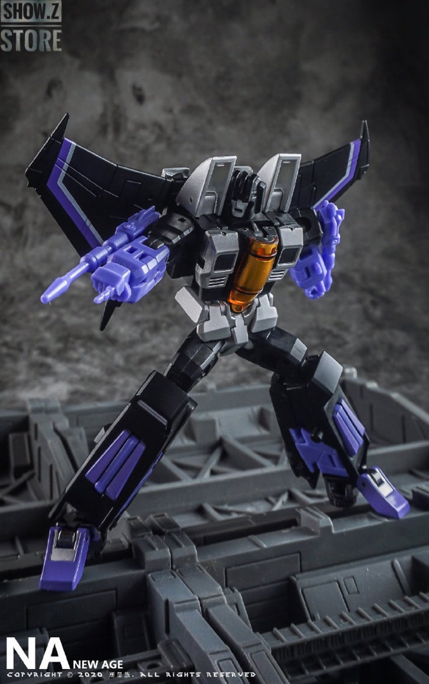 NewAge purple and black robot warrior with glowing weapons and spikes NewAge purple and black robot warrior with glowing weapons and spikes