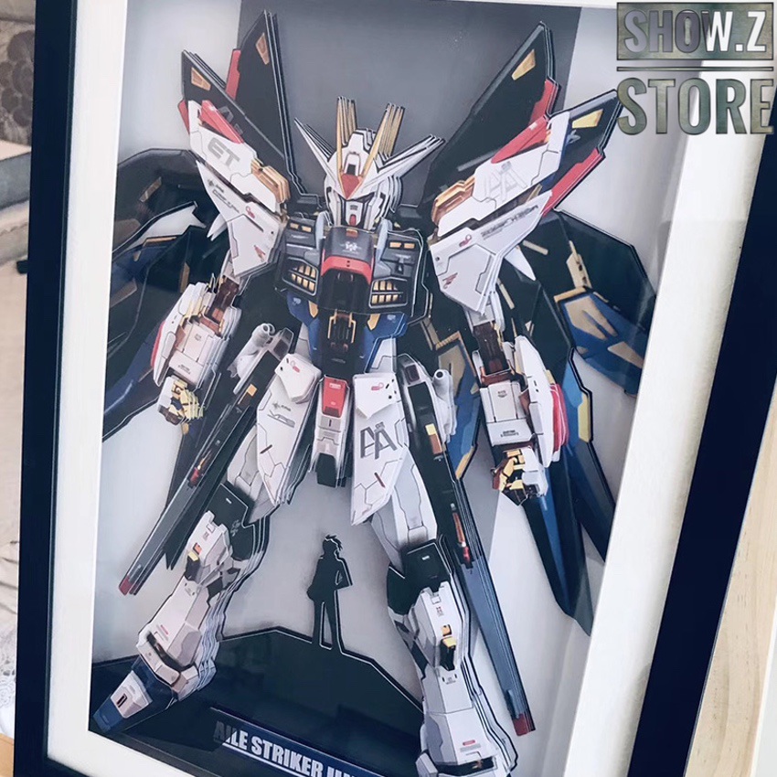 Detailed Strike Gundam model with extended blue and red wings Detailed Strike Gundam model with extended blue and red wings
