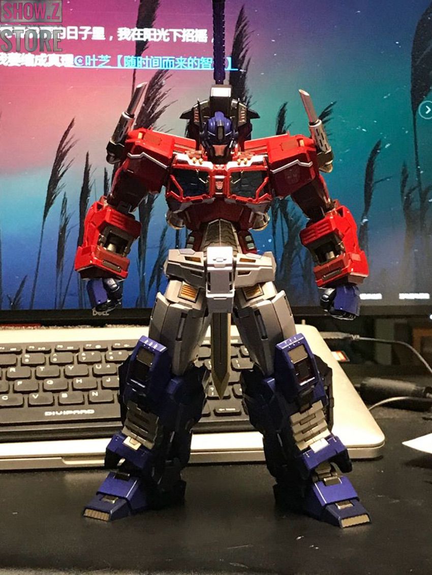 Gold robot photographed in full body battle pose with extended positioning Gold robot photographed in full body battle pose with extended positioning