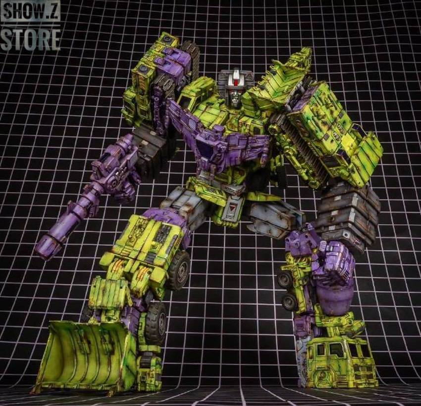 Assembled lime green and purple robot with articulated limbs in action pose Assembled lime green and purple robot with articulated limbs in action pose
