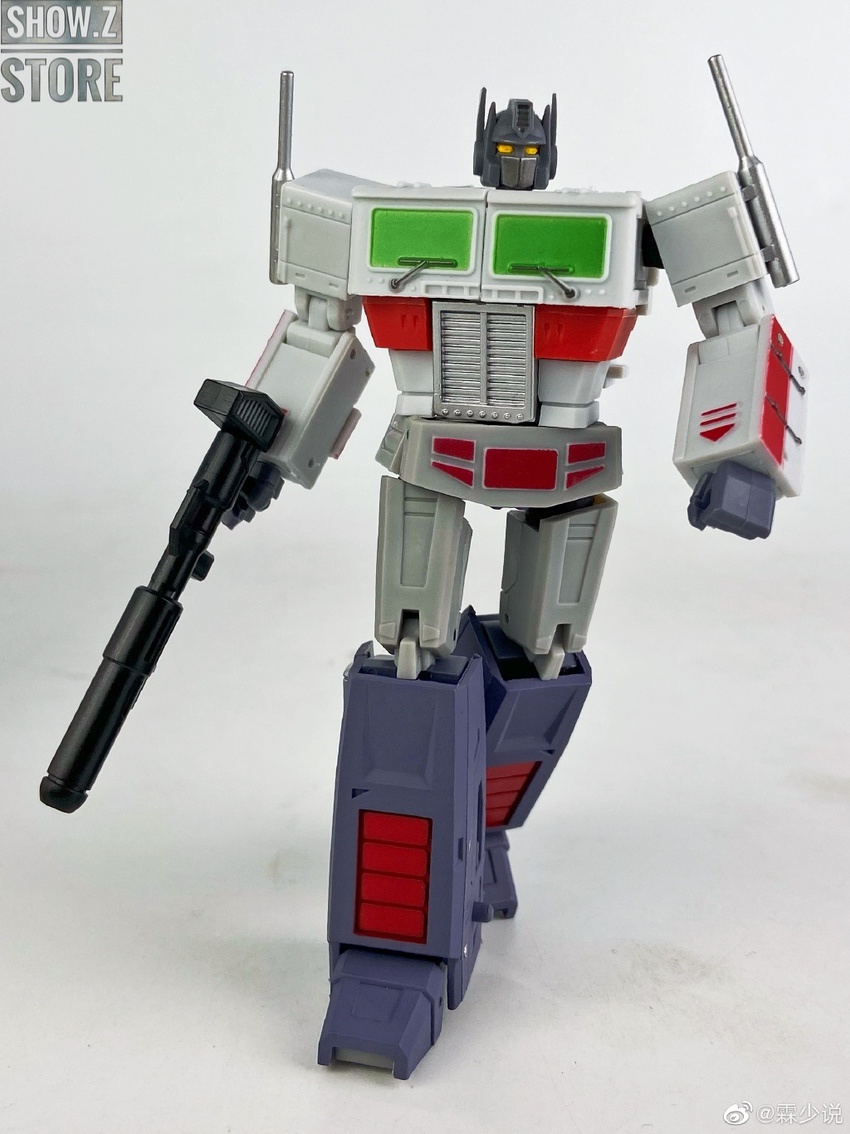 Multicolored transformer with extended arm attachments and cannon Multicolored transformer with extended arm attachments and cannon