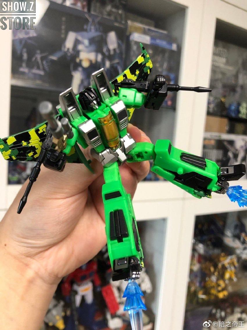 Green yellow pixelated jet in robot form Green yellow pixelated jet in robot form