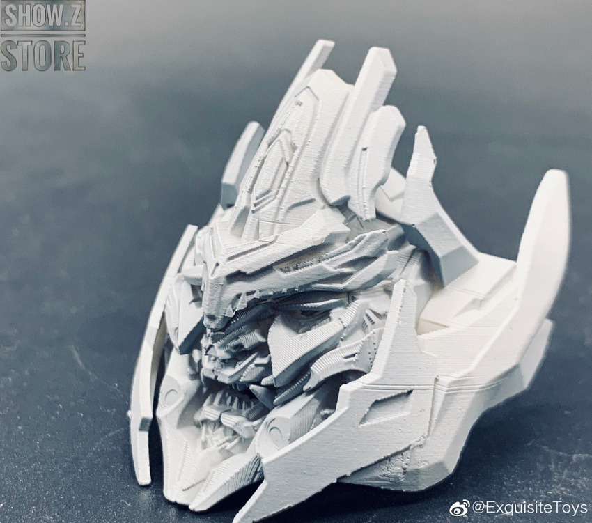 Megatron head with intricate internal machinery visible Megatron head with intricate internal machinery visible