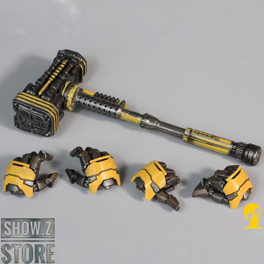 Yellow and black hammer weapon with multiple segments Yellow and black hammer weapon with multiple segments