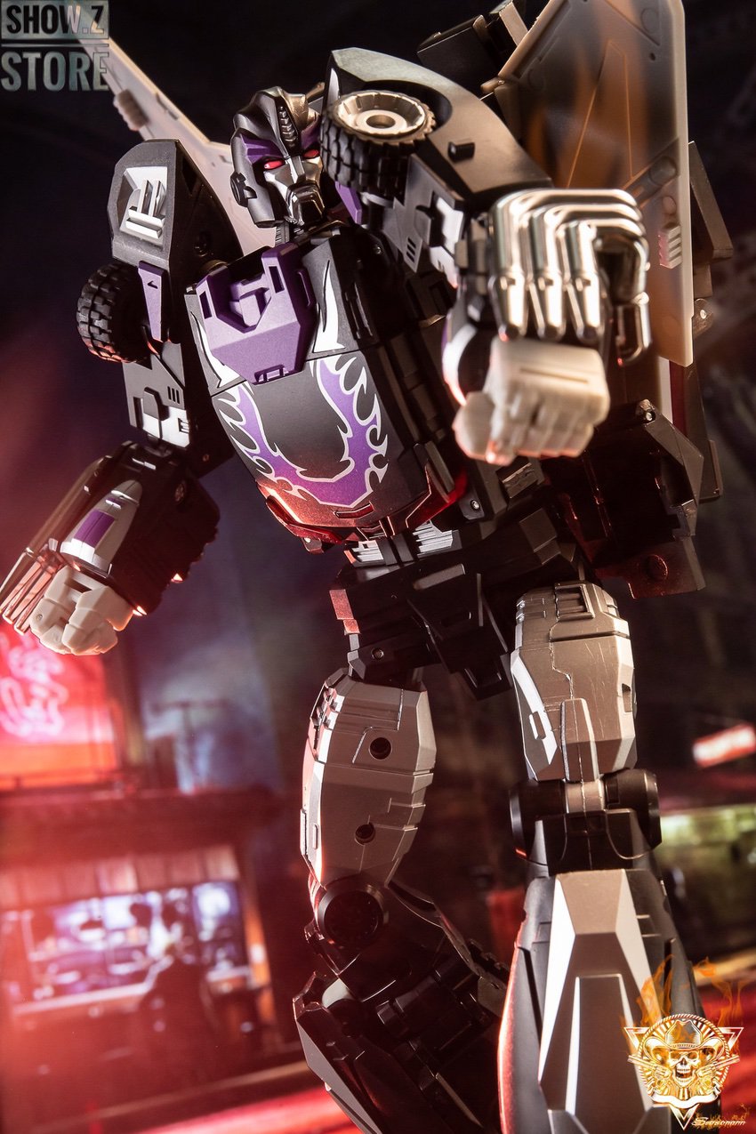 Action pose showing robot with extended weapon and limbs Action pose showing robot with extended weapon and limbs