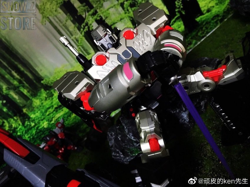 MMC Tyrantron red black white robot side angle showing vehicle parts MMC Tyrantron red black white robot side angle showing vehicle parts