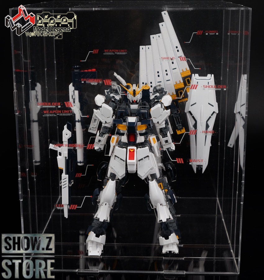 1/144 scale Nu Gundam model with labeled internal mechanisms 1/144 scale Nu Gundam model with labeled internal mechanisms