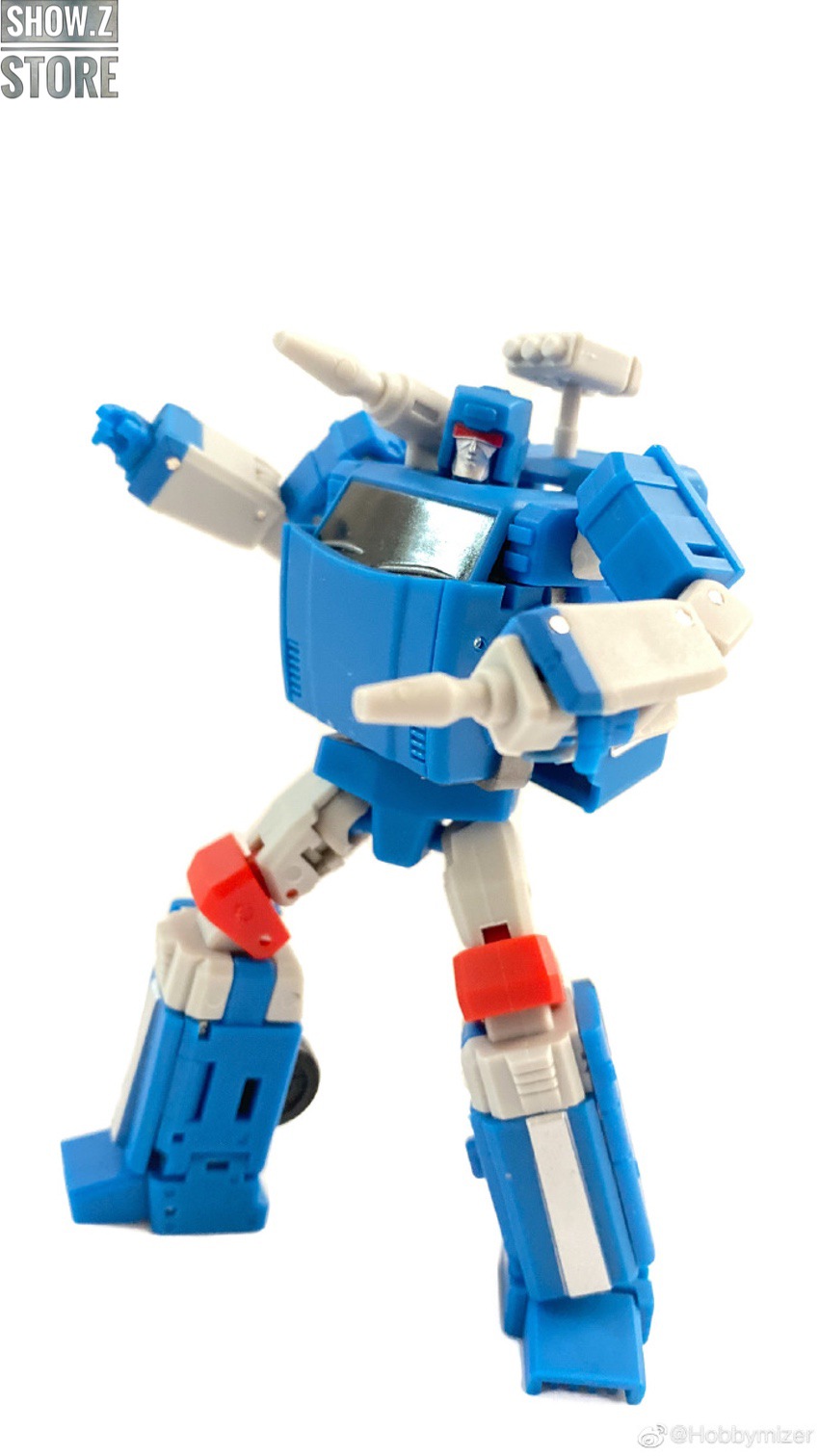 Blue robot action figure with extended limbs in dynamic pose Blue robot action figure with extended limbs in dynamic pose