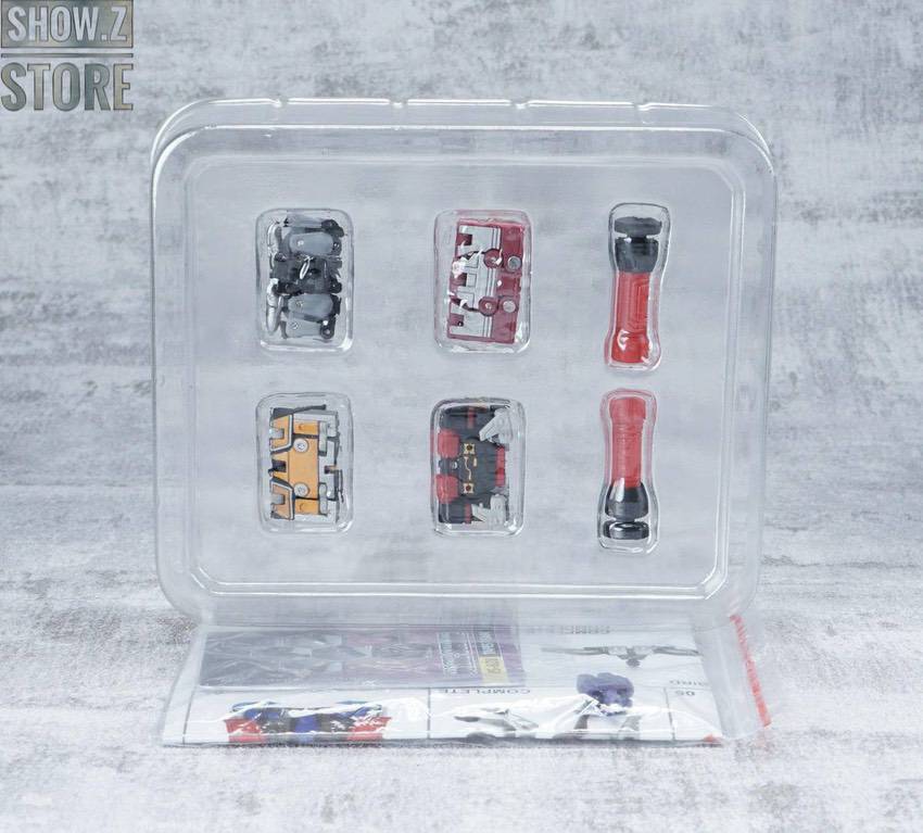 Open packaging showing four colorful cassette robots Open packaging showing four colorful cassette robots