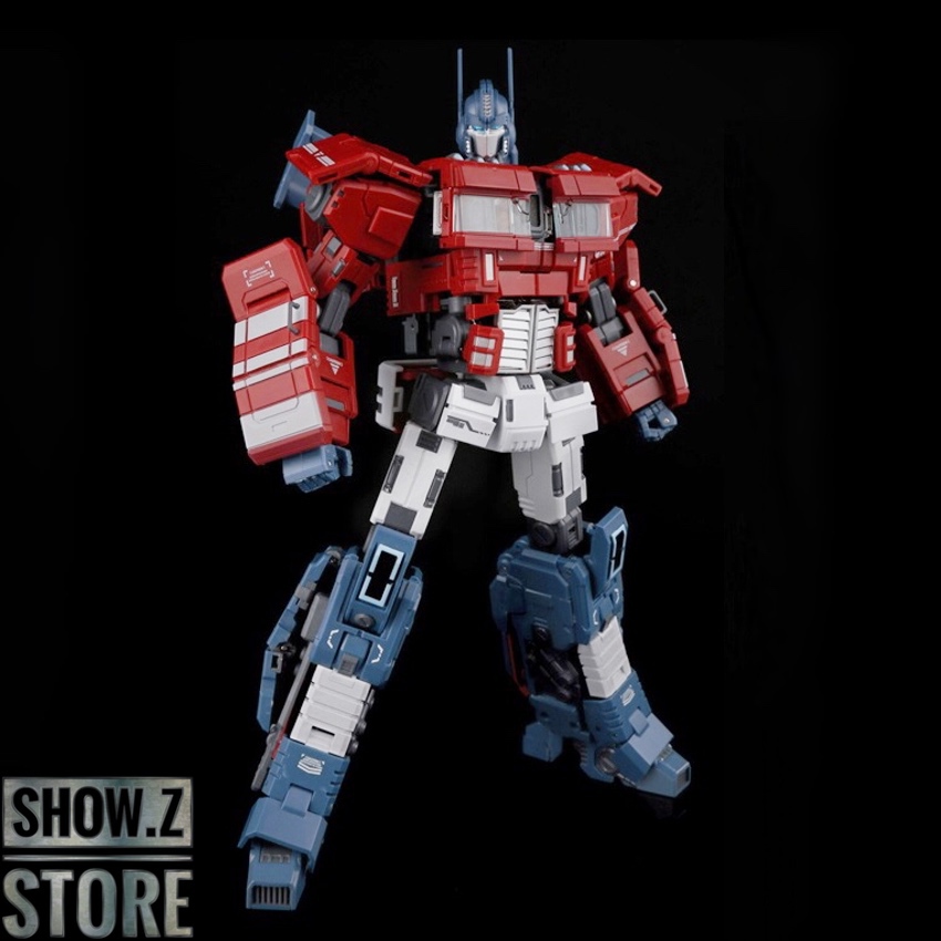 Red yellow blue robot with large white wings deployed Red yellow blue robot with large white wings deployed