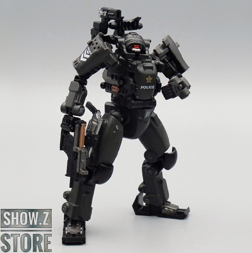 Dark gray robot with red chest emblems and hand weapons Dark gray robot with red chest emblems and hand weapons