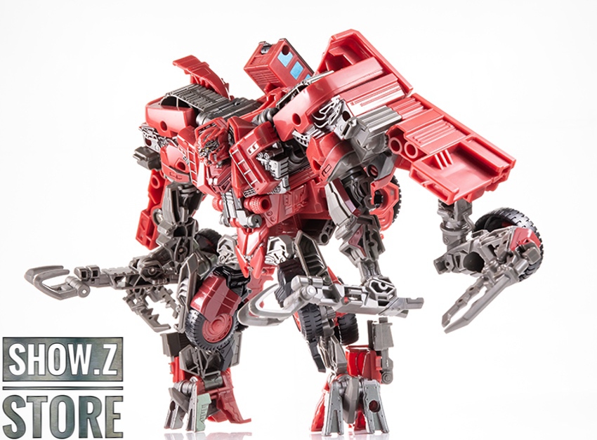 Red transformation robot displaying alternate insect beast vehicle mode Red transformation robot displaying alternate insect beast vehicle mode
