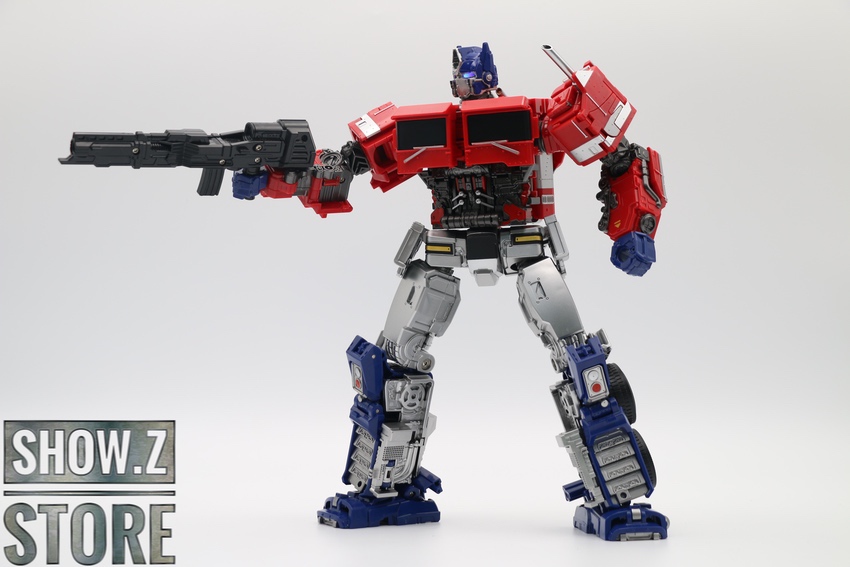 Red robot figure with complex transformation joints and black cannon Red robot figure with complex transformation joints and black cannon