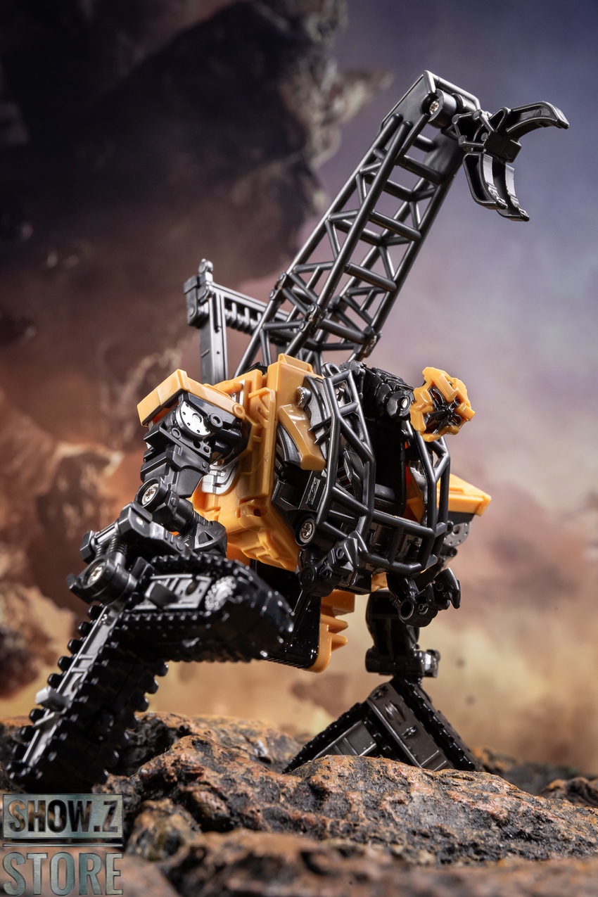 Yellow construction crane robot with black excavator bucket arm Yellow construction crane robot with black excavator bucket arm