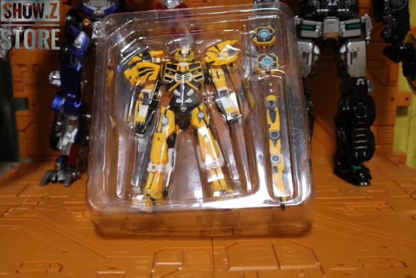 Yellow black armor robot dynamic action pose with weapons armed Yellow black armor robot dynamic action pose with weapons armed