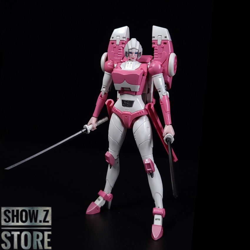 Pink and white female robot in standing pose with sword Pink and white female robot in standing pose with sword