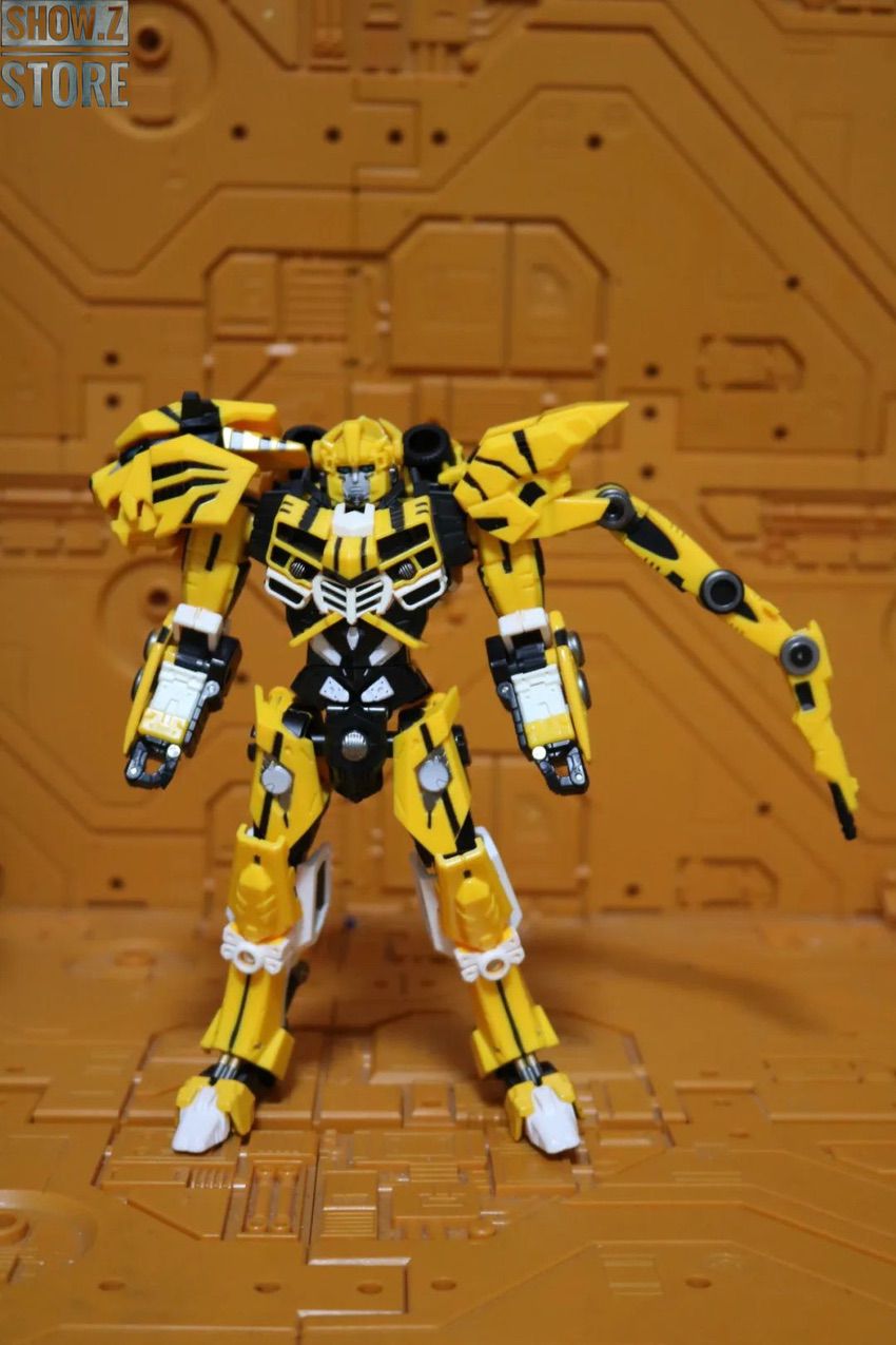Large yellow robot standing display with transformation accessories Large yellow robot standing display with transformation accessories