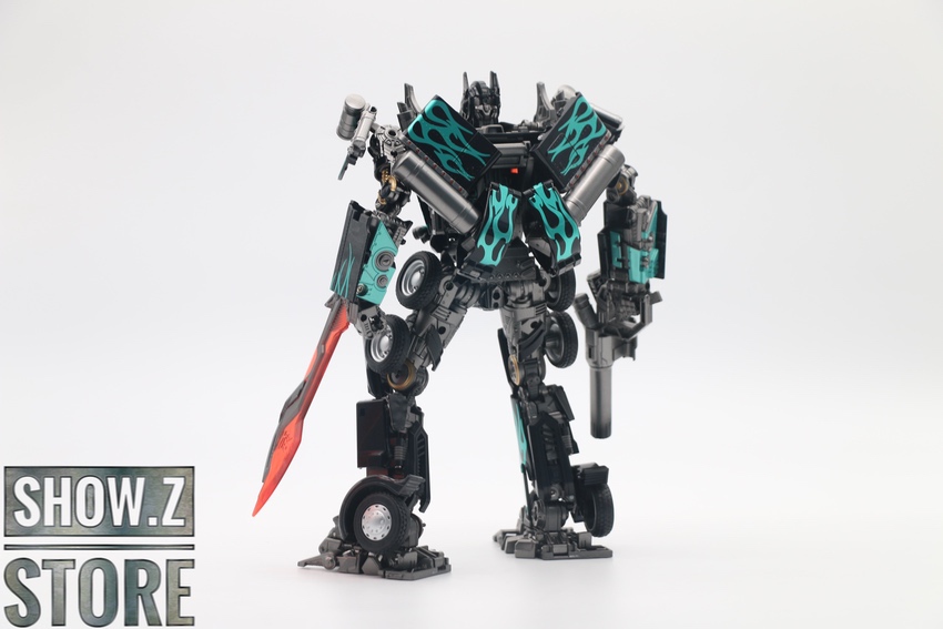Nemesis Prime mecha robot with golden armor extended weaponry Nemesis Prime mecha robot with golden armor extended weaponry