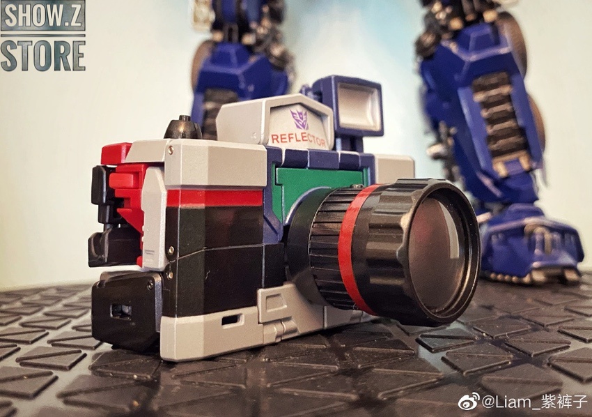 Reflector camera front view with green and red color details display Reflector camera front view with green and red color details display