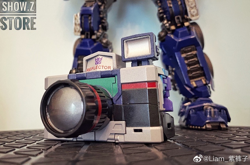 Reflector rear window feature with purple robot figure focus Reflector rear window feature with purple robot figure focus