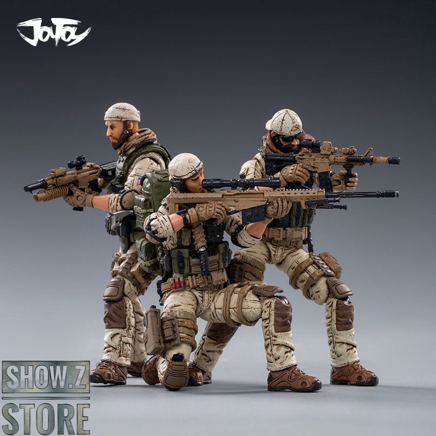Two Delta Force operators in action poses carrying rifles, one elevated position Two Delta Force operators in action poses carrying rifles, one elevated position