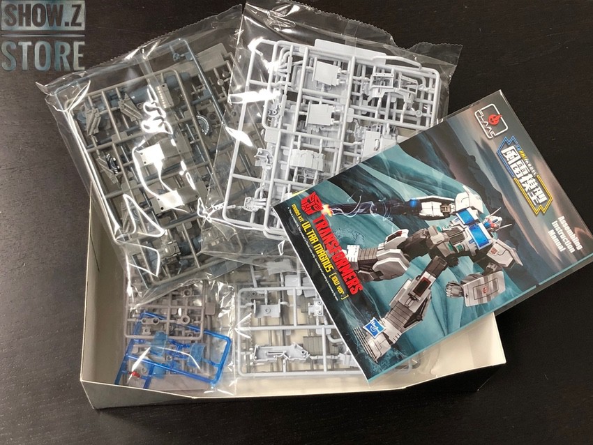 Flame Toys Ultra Magnus model kit unboxed with parts and instructions Flame Toys Ultra Magnus model kit unboxed with parts and instructions
