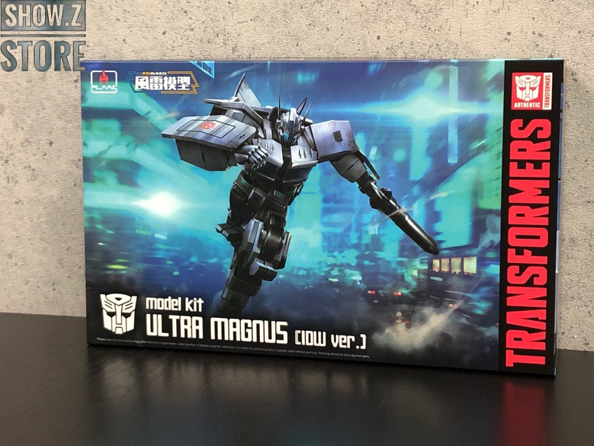 Flame Toys Furai Ultra Magnus Model Kit black mecha with blue armor details Flame Toys Furai Ultra Magnus Model Kit black mecha with blue armor details