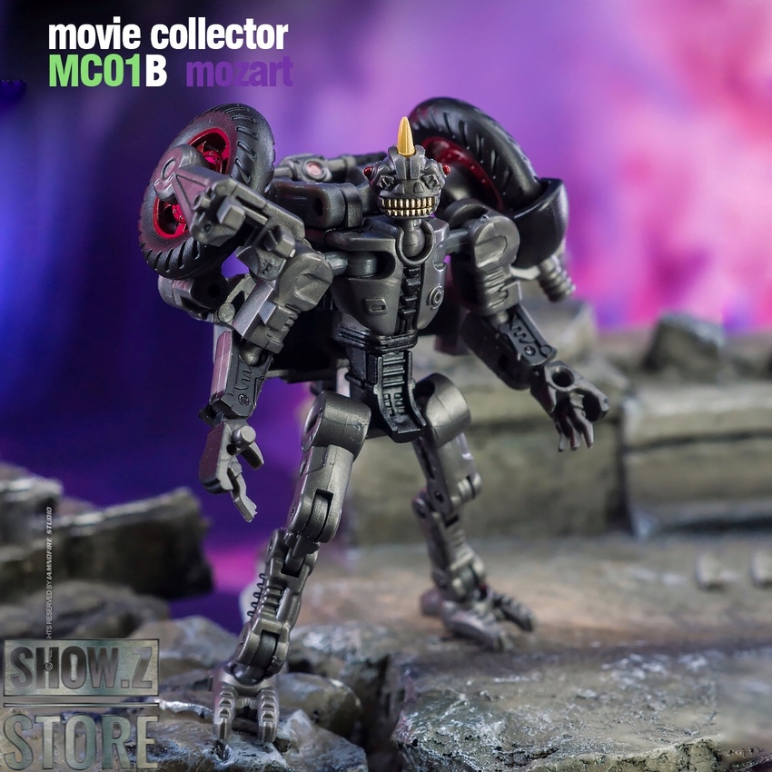 Mozart Mohawk black robot jumping in mid-air with red eye details Mozart Mohawk black robot jumping in mid-air with red eye details